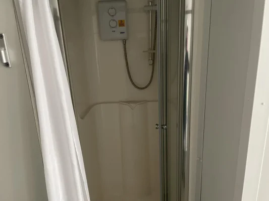 Shower Inside a Modular Cabin 