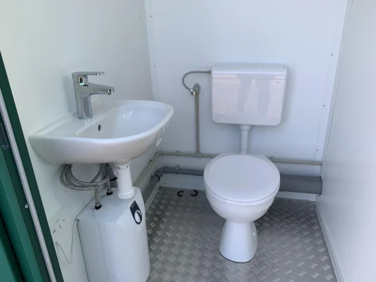 Sink and Toilet Inside a Modular Cabin 